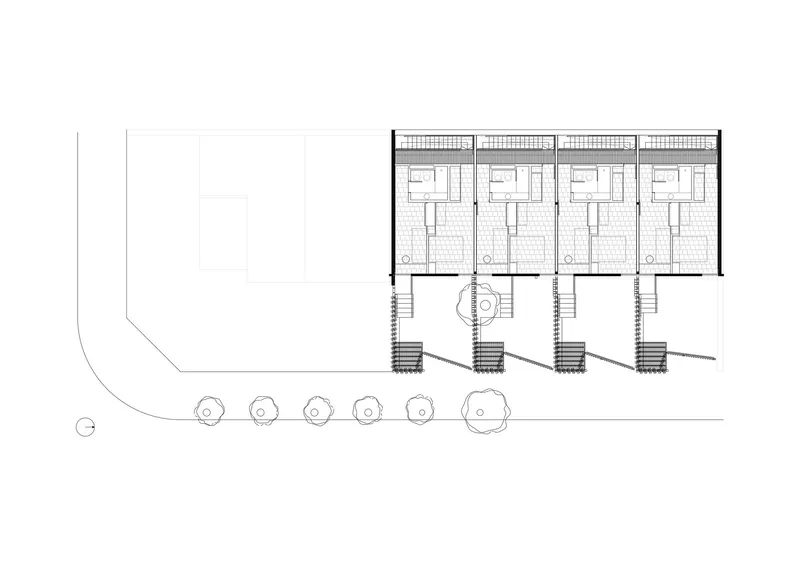 Floor plan drawing showing four residential units with street-facing trees in circular planters