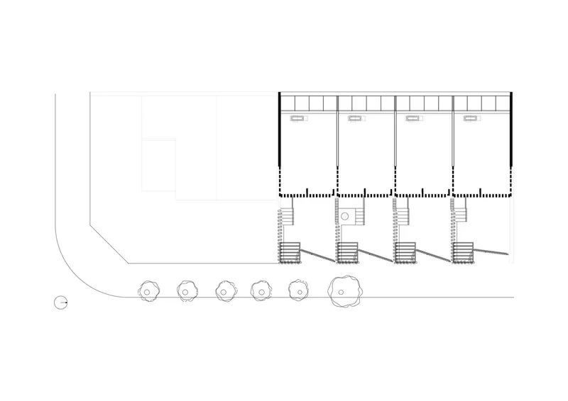Floor plan drawing showing four open-plan units with clerestory windows and circular tree planters outside