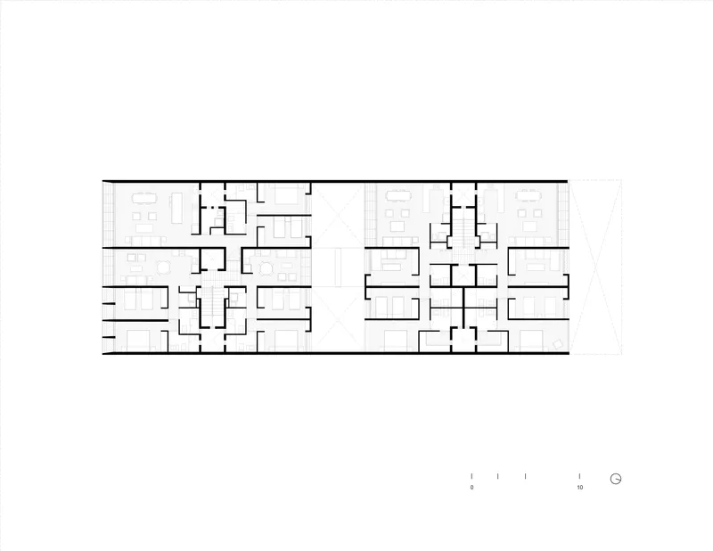 Floor plan drawing showing two residential blocks with mirrored units and central circulation cores
