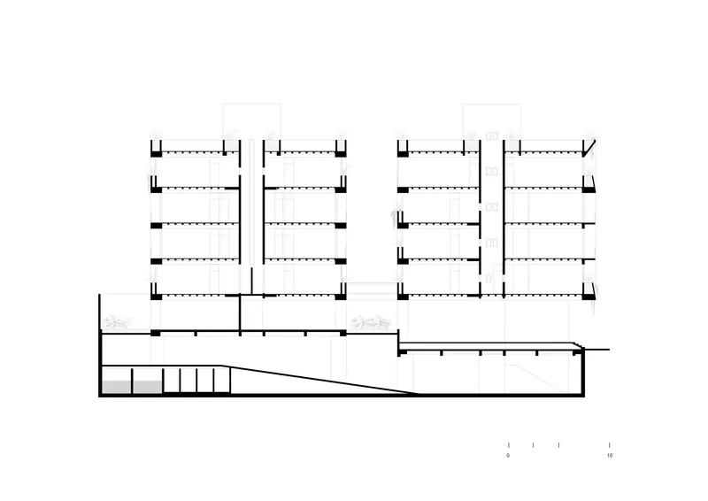Section drawing showing stacked floors with diagonal stair connecting lower level to upper residential units