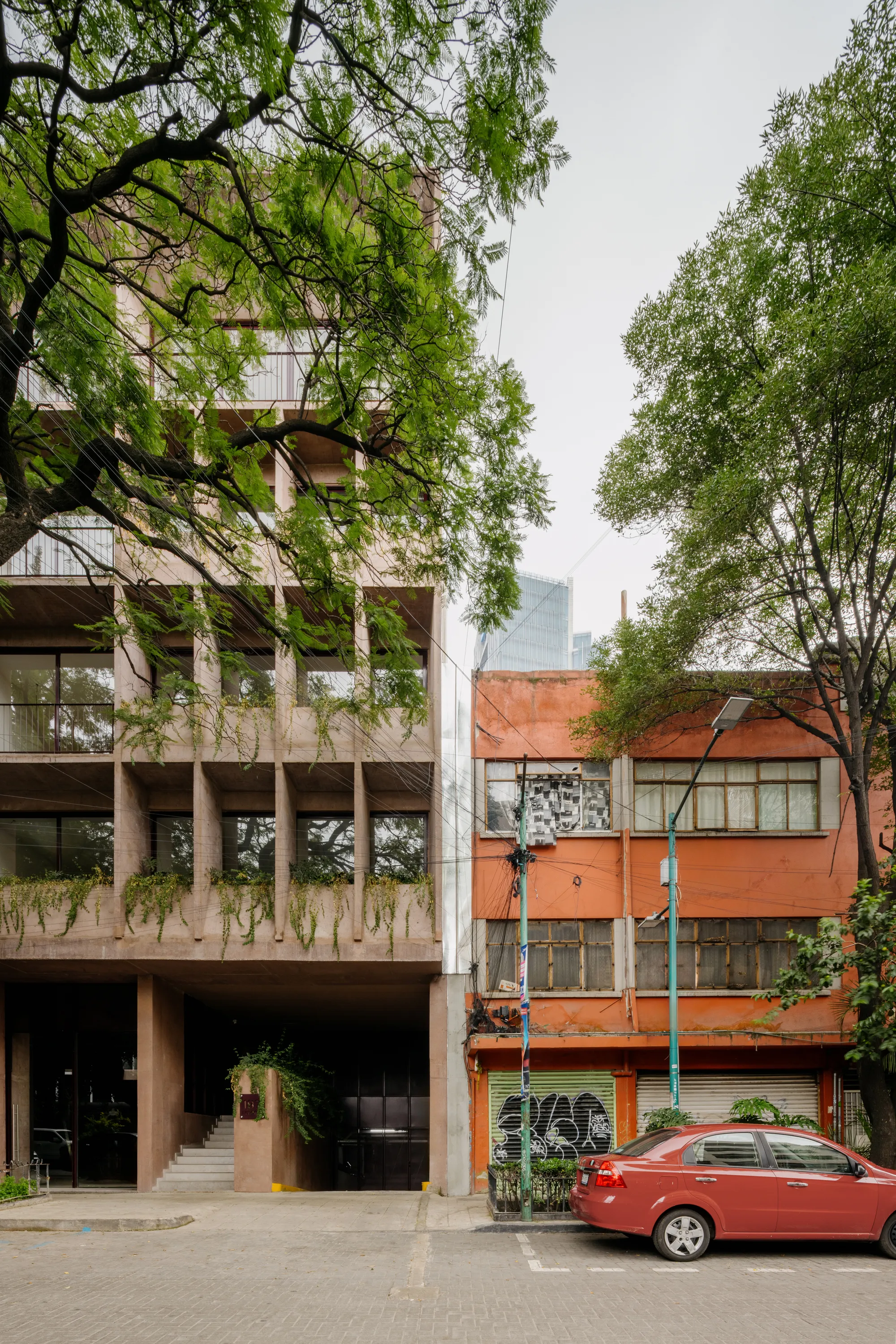 CCA and Olga Romano Weave Greenery into a Pigmented Concrete Housing Block in Mexico City