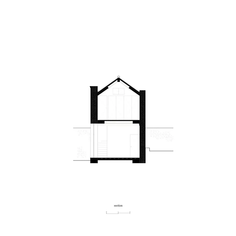 Section drawing showing a two-story house with pitched roof and central staircase