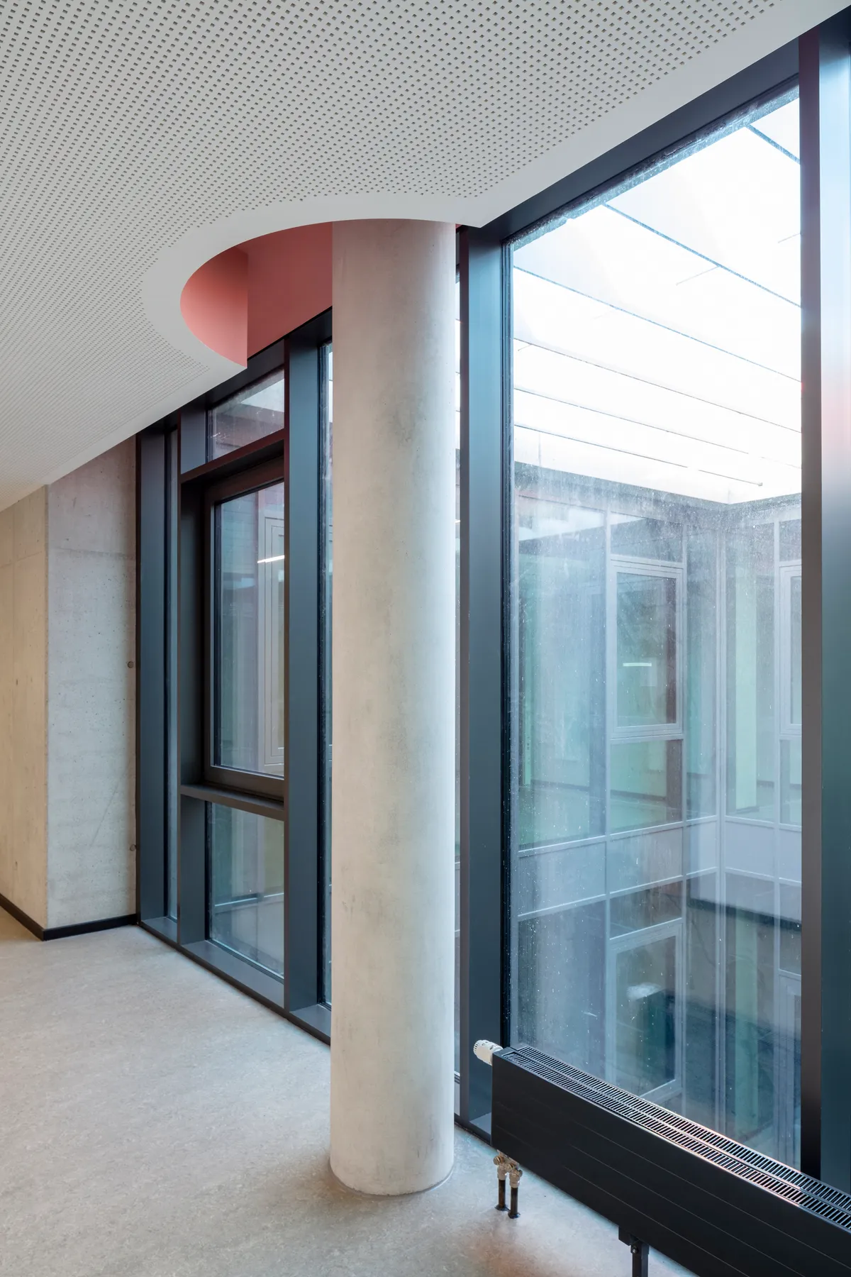 SSP SchürmannSpannel Wraps a Dortmund School in Pink and Rethinks the Corridor
