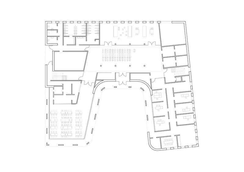 Ground floor plan drawing with curved central hall, seating rows, and flanking office spaces