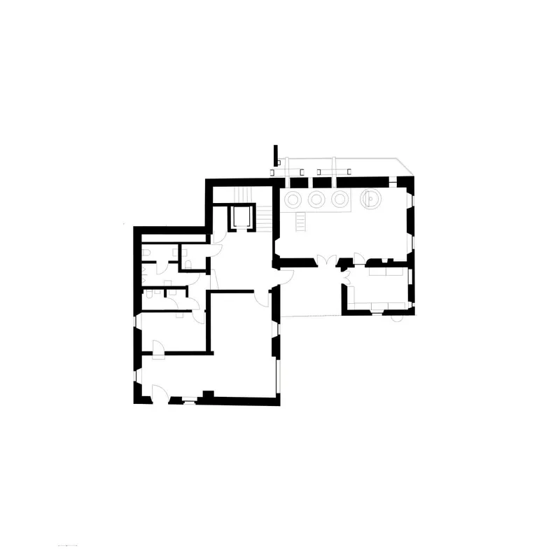 Ground floor plan drawing depicting thick-walled rooms arranged around a central staircase