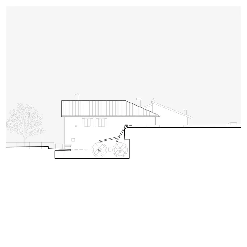 Section drawing showing the interior spaces with varying ceiling heights and mechanical plant below grade
