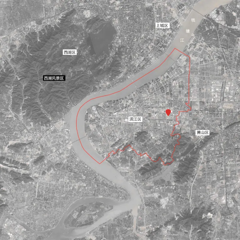 Aerial site map showing the river bend and urban context with a red boundary outline