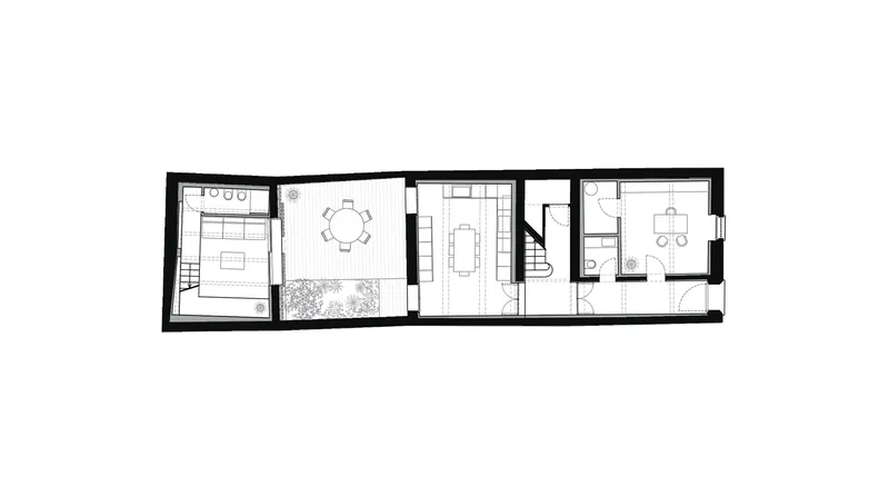 Floor plan drawing showing linear arrangement of bedroom, courtyard, dining, kitchen and stair