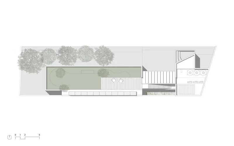 Ground floor plan drawing with linear garden courtyard flanked by pool and exterior stairs with street trees