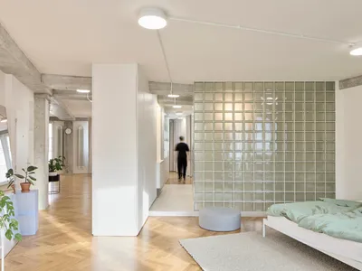 RDTH architekti Rips Out Nearly Every Wall in a Prague Apartment and Replaces Them with Furniture