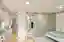 RDTH architekti Rips Out Nearly Every Wall in a Prague Apartment and Replaces Them with Furniture
