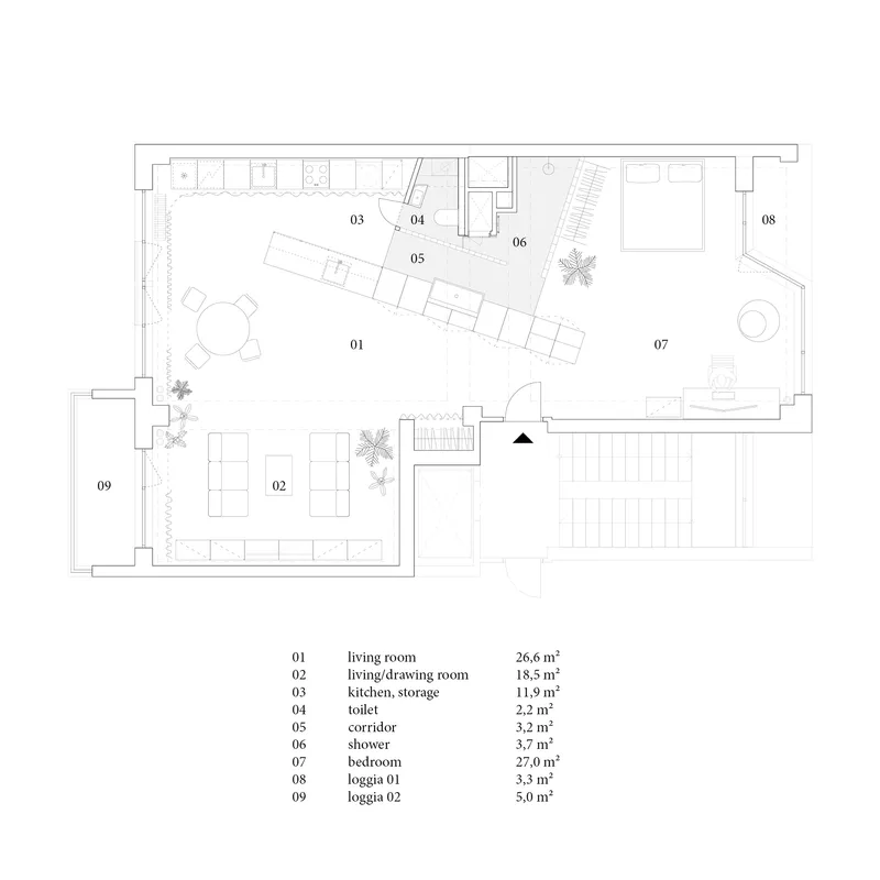Floor plan drawing showing open living room with angled kitchen counter and multiple loggias