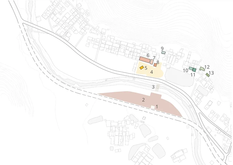 Site plan drawing showing numbered building clusters positioned between roadways with topographic terrain lines