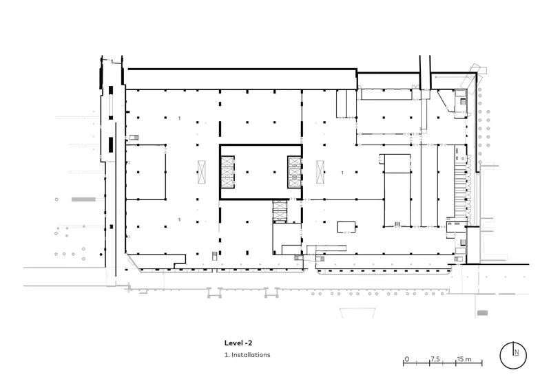 Level two floor plan drawing showing installations area with large open space and perimeter service zones