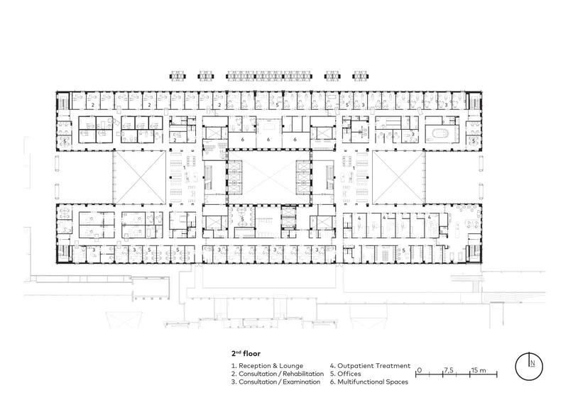 Second floor plan showing a rectangular layout with central courtyards and perimeter rooms