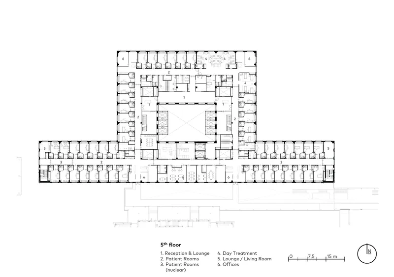 Fifth floor plan showing symmetrical patient room wings with central courtyard and service cores