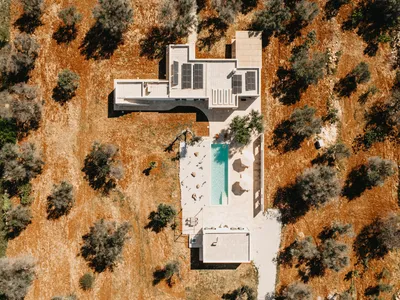 Urban Interior Pairs a New Villa with a Converted Lamia in a 400-Year-Old Pugliese Olive Grove