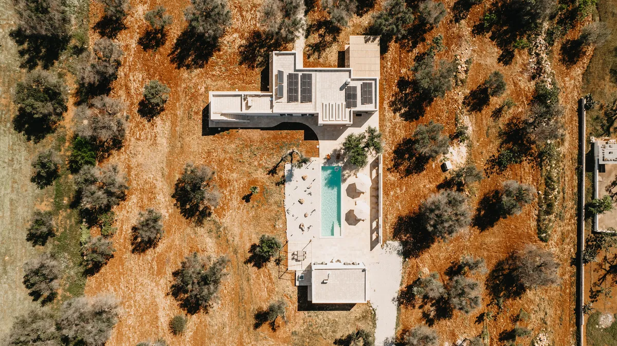 Urban Interior Pairs a New Villa with a Converted Lamia in a 400-Year-Old Pugliese Olive Grove