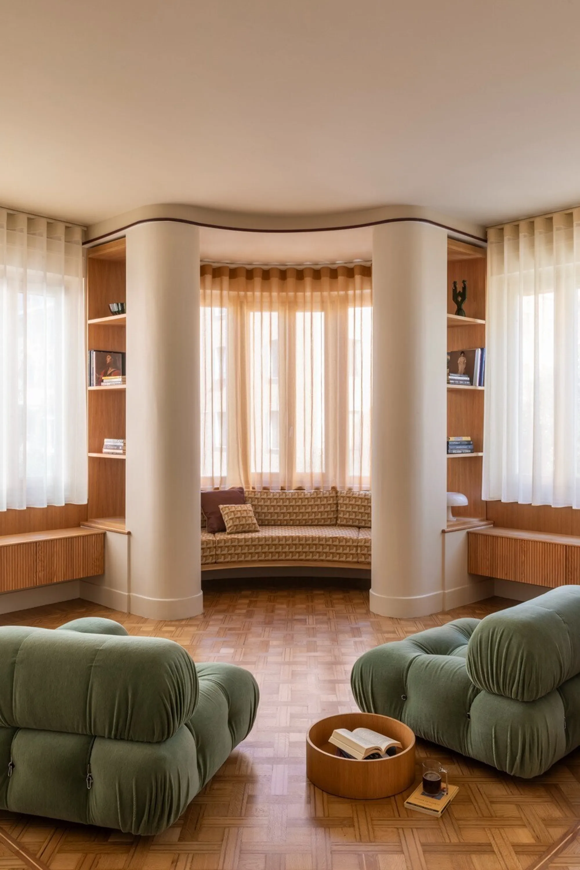 STUDIOTAMAT Turns a Fragmented Roman Apartment into a Flowing Sequence of Rooms and Books