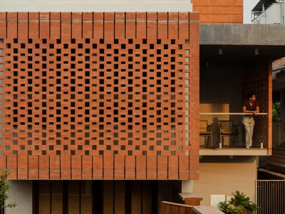 7th Hue Architecture Collective Filters Kerala's Light Through a Compact Brick and Timber Home