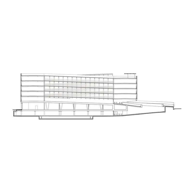 Section drawing showing the parking levels below the elevated tower with angled supports