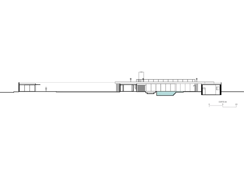 Section drawing showing the low-slung horizontal profile with central courtyard and flanking pavilions