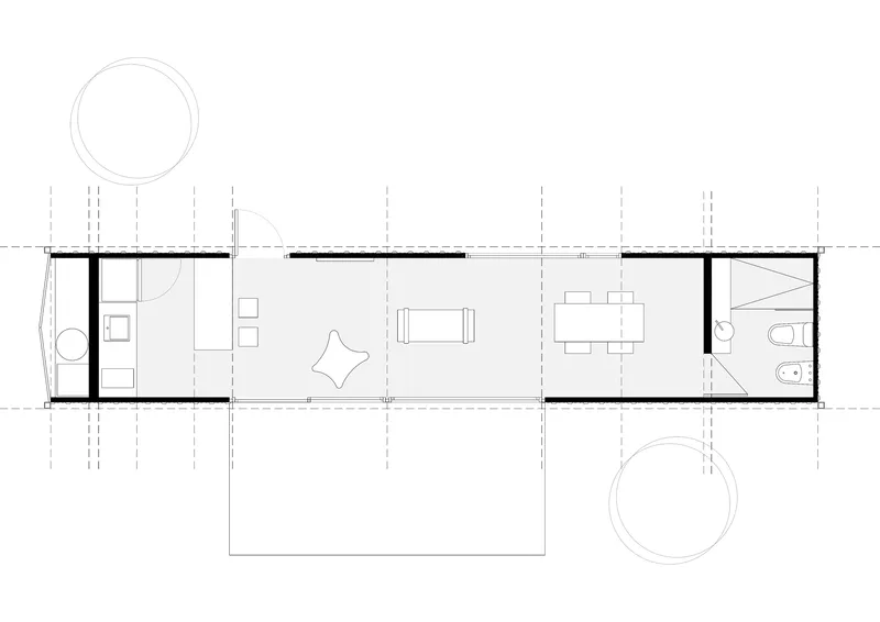Floor plan drawing showing a linear arrangement of bathroom, living, and dining spaces between two outdoor areas
