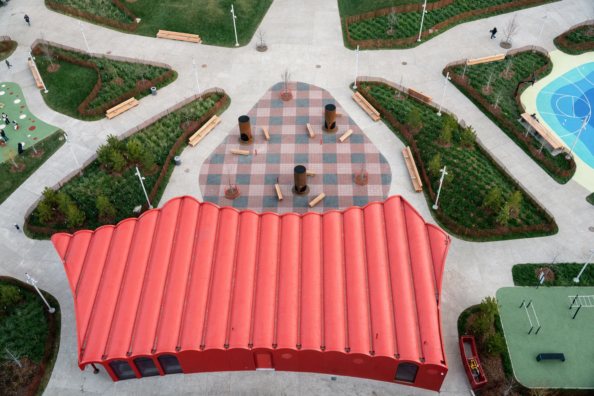 gh3* Wraps a Barrel-Vaulted Strawberry-Red Pavilion Around Edmonton's Newest Park