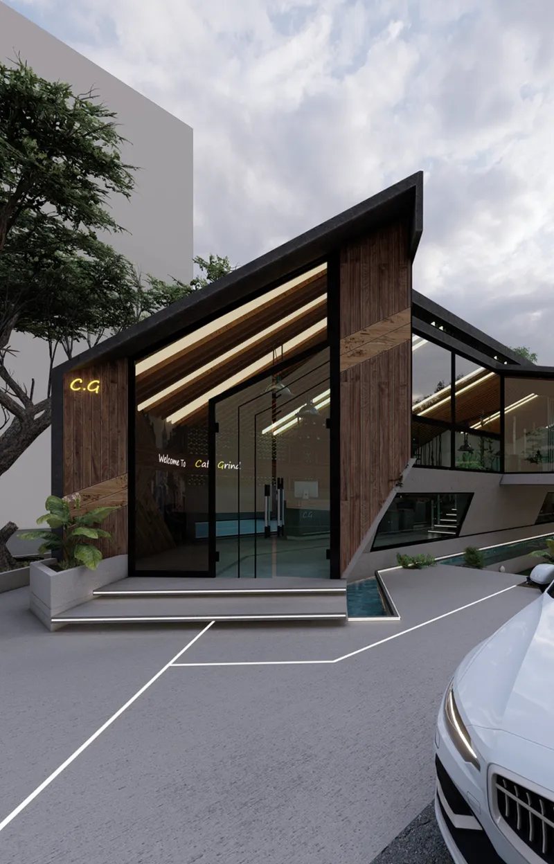 A welcoming entrance framed by dramatic rooflines, warm materials, and transparent façades.