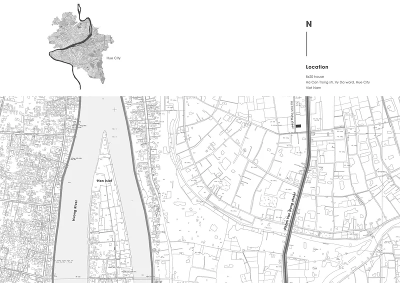 Site plan drawing showing a curved plot adjacent to a river with surrounding urban fabric