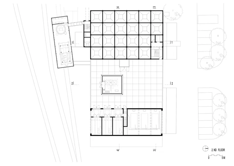Second floor plan drawing showing modular office grid, terrace space, and service areas
