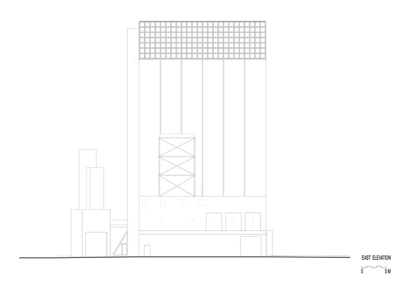 East elevation drawing showing a tall facade with gridded crown and adjacent lower buildings