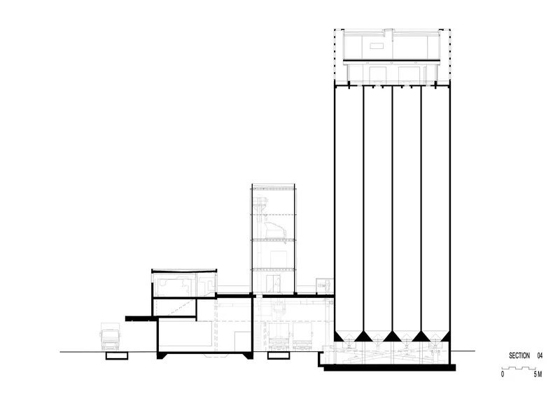 Section drawing showing sloped conical supports beneath the tower and stepped interior levels in adjacent volumes