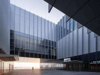 gmp Architects Plants a Metal-Clad Science Museum on the Edge of Jiaozhou Bay