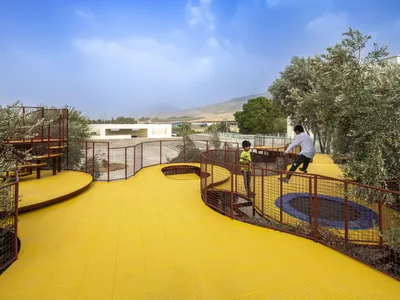 ZAV Architects Weave a Playground Through an Olive Orchard in Northeastern Iran