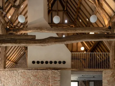 ZOOM Architecten Transforms a Belgian Moat Farm into a Flexible Community Center in Eeklo