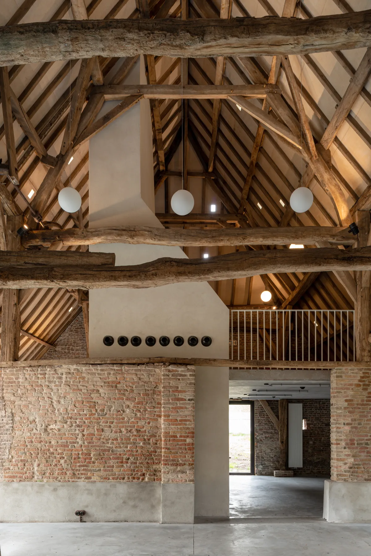 ZOOM Architecten Transforms a Belgian Moat Farm into a Flexible Community Center in Eeklo