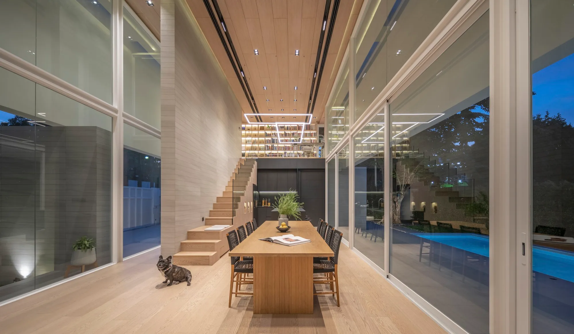 One and a Half Architects Center a Bangkok Home Around a Double-Height Living Room That Breathes