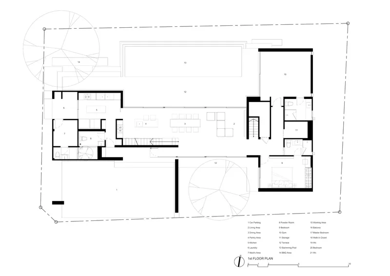 First floor plan drawing showing open living areas, pool, and two circular tree canopies