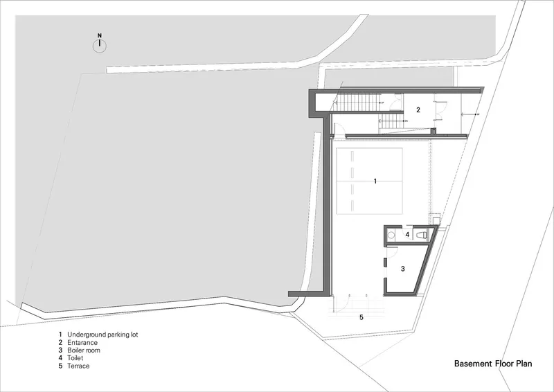 Basement floor plan drawing showing underground parking lot with entrance stair and service rooms