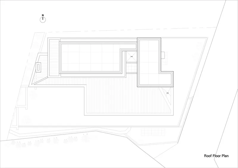 Roof floor plan drawing showing rooftop pool deck and L-shaped planted terrace areas