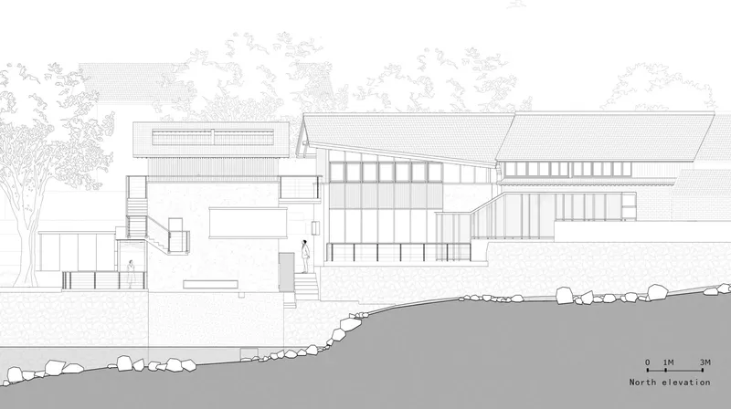 North elevation drawing showing the building stepping down the hillside toward a rocky stream bed