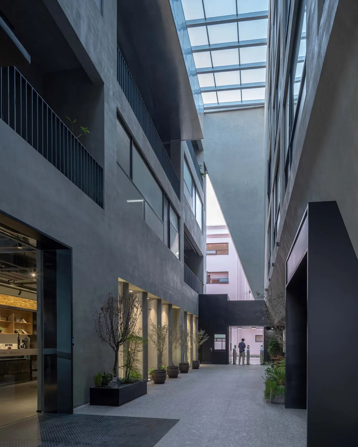 Diagonal Architectural Design Wraps a Shenzhen Factory Renovation in Terracotta and Light