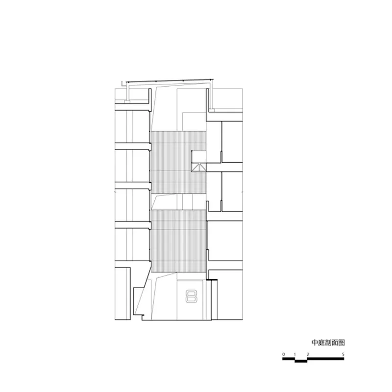 Floor plan drawing showing two rectangular courtyards flanked by rooms on both sides