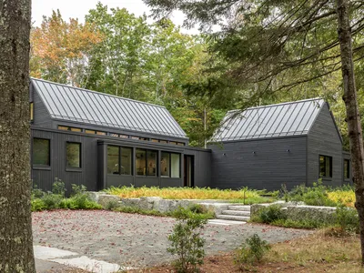 ElliottArchitects Builds a Dark Gabled House on a Century-Old Foundation in Blue Hill, Maine