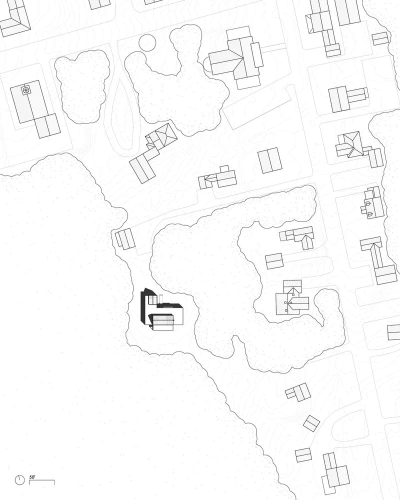 Site plan drawing showing structures scattered among irregularly shaped clusters representing trees and topography
