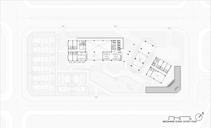 Mezzanine floor plan showing reduced footprint with central amenity spaces and angled circulation