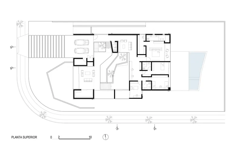 Upper floor plan drawing showing bedrooms and cantilevered deck overlooking the rear yard