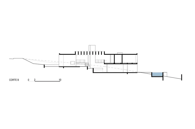 Section drawing revealing relationship between interior levels and outdoor pool on descending site