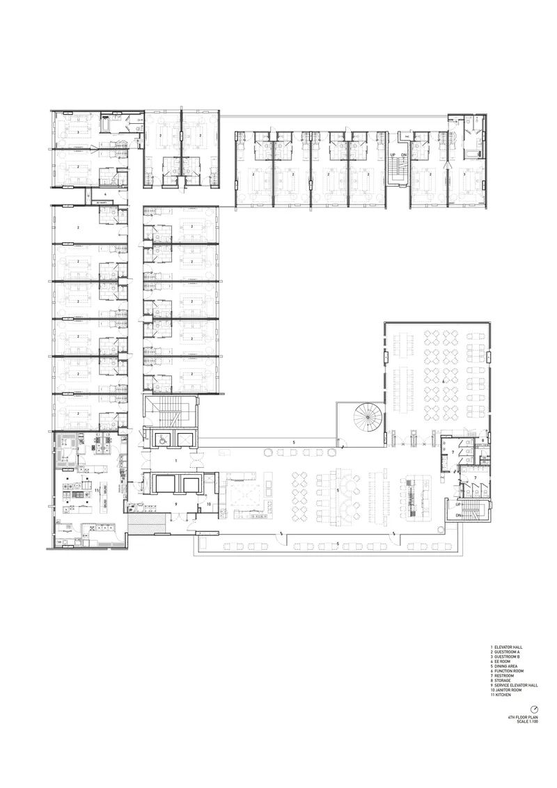 Ground floor plan drawing showing U-shaped building with central courtyard and seating areas
